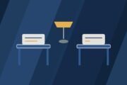 Editorial illustration of two desks facing each other with a shared lamp.