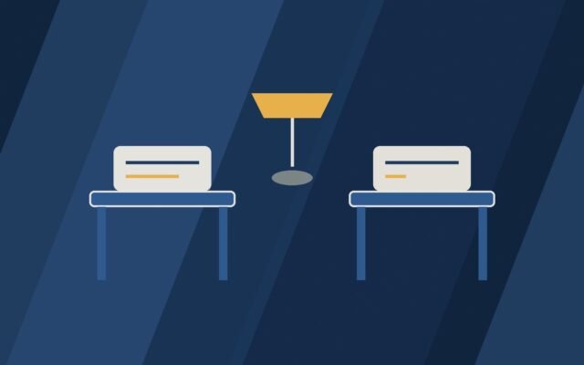 Editorial illustration of two desks facing each other with a shared lamp.